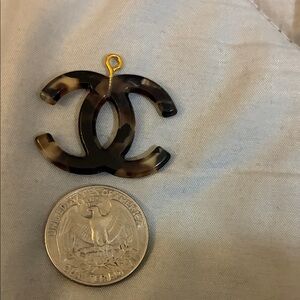 CHANEL Stamped Brown and Black Charm